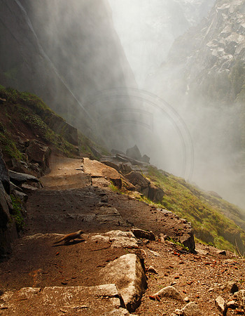 Steep footpath into waterfall mist